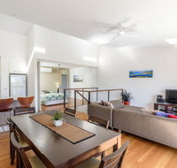 Unit 4 Rainbow Surf - Modern double storey townhouse with large shared pool close to beach and shop - Accommodation Rockhampton