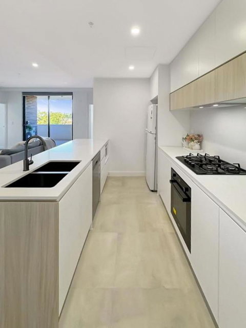 Modern 2BR Suite With Balcony & Parking Near Airport - Accommodation Rockhampton 1