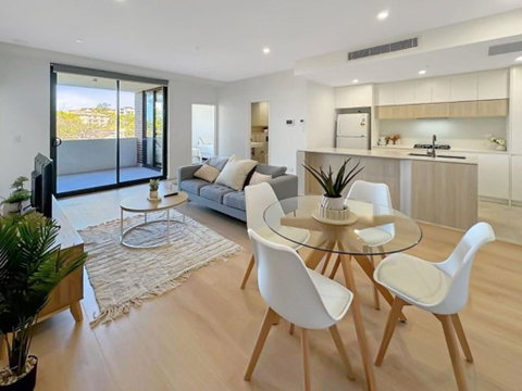 Modern 2BR Suite With Balcony & Parking Near Airport - Accommodation Rockhampton 0